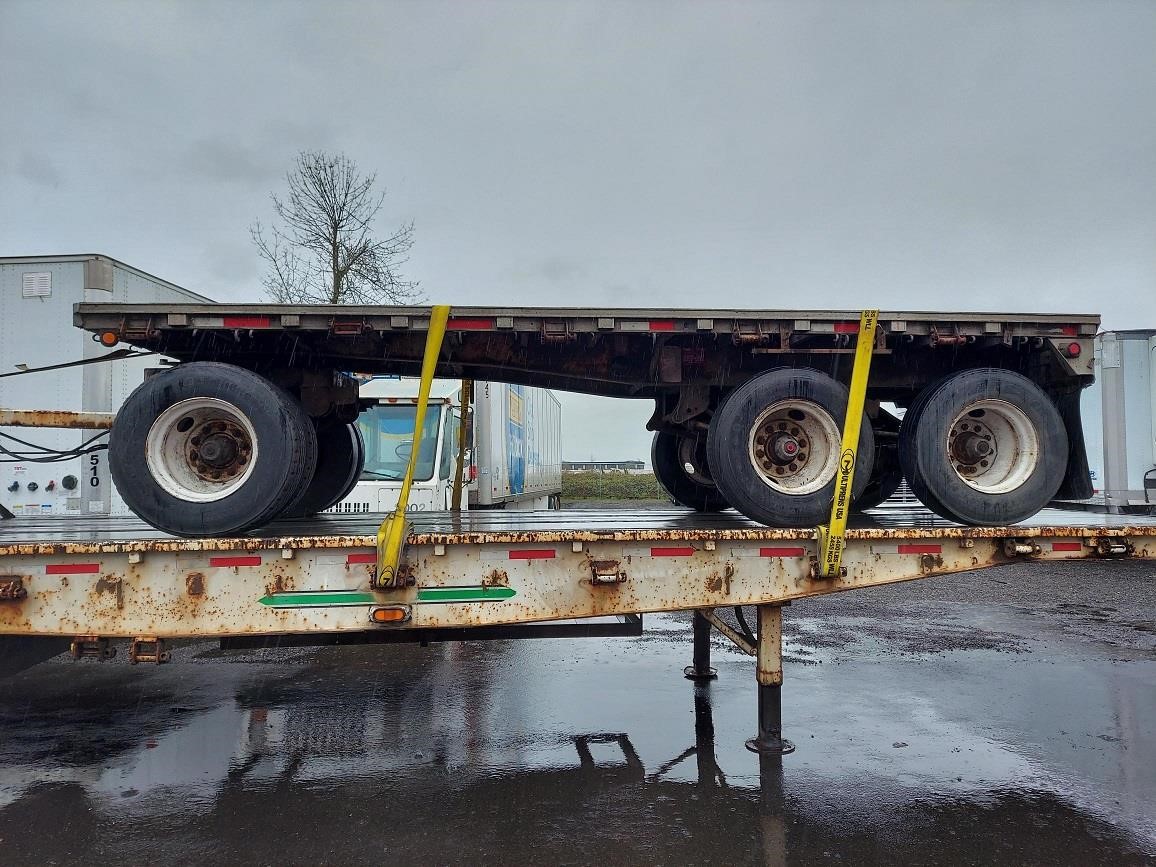 1988 WESTERN TRAILERS 20' WITH 8' NECK 2 AXLE SPRING RIDE FIXED FLATBED 8064767413